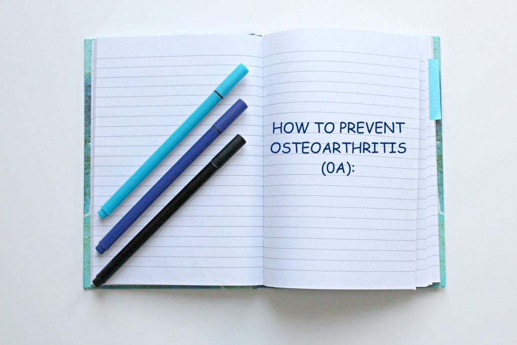 Notebook saying How to Prevent Osteoarthritis (OA)